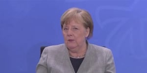 As Germany's curve flattens,Merkel warns caution