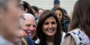 Nikki Haley takes photos with attendees during a bus tour campaign event at Moncks Corner Train Depot in Moncks Corner,South Carolina.
