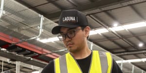 Seasonal workers like Chris Halili are in high demand as mail processing ramps up over the busy Christmas period.