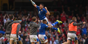 Juan Ignacio Brex is lifted high by Toa Halafihi during Italy’s one-point win over Wales earlier this year. 
