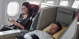 The lie-flat seat is OK on length,but not much wider than a standard economy seat.
