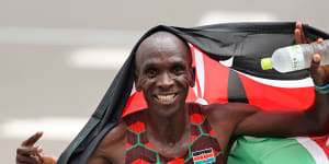 Kenyan Eliud Kipchoge celebrates winning back-to-back Olympic gold medals in the men’s marathon. 