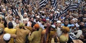 Supporters of the religious Jamiat Ulema-e-Islam-F party rally in Karachi,Pakistan,on Sunday,to denounce the burning of the Koran in Sweden.