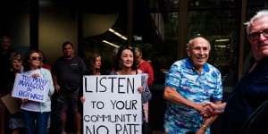 Protesters gather outside the Northern Beaches Council meeting.