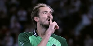 Daniil Medvedev celebrates after defeating Alexander Zverev in their five-set semi-final match at the Australian Open.