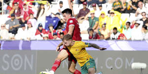 Baggott fights for the ball with McGree.