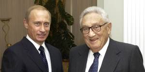 Henry Kissinger with Russian President Vladimir Putin in 2004.