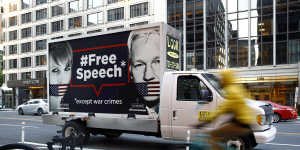 A Free Speech poster vehicle with images of Chelsea Manning and WikiLeaks founder Julian Assange in Washington.