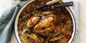 ***EMBARGOED FOR GOOD WEEKEND,AUGUST 15/20 ISSUE*** Karen Martini recipe:Roast chicken on baked rice with tomato,cumin&amp;bay Photograph by William Meppem (photographer on contract,no restrictions)Â 