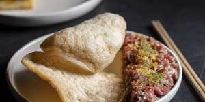 Korean-style steak tartare with prawn crackers.