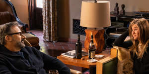 Mitch Kessler (Steve Carell) and Alex Levy (Jennifer Aniston) enjoy a drink in his “Italian” retreat.