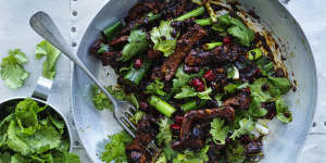 Adam Liaw's stir-fried lamb with coriander and Sichuan pepper.