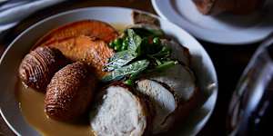 Sunday roast served with Hasselback spuds.