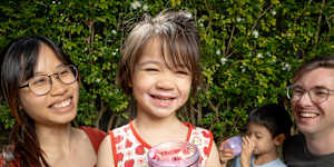 Kitty and Daniel Fewchuk feed their children Hazel,3,and Lucas,5,berry smoothies.