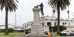 Queen Victoria monument doused in paint after vandals hack off Captain Cook statue