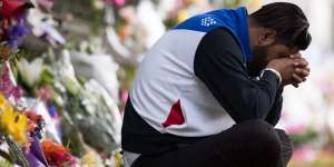 A makeshift memorial in Christchurch after a terror attack left at least 50 people dead.