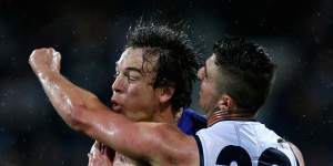 Liam Picken marks the ball in front of Geelong’s Shane Kersten in a 2016 game.