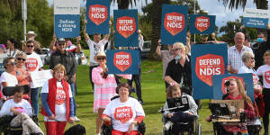 Penny Manning (right) joins a protest in support of the NDIS in Geelong in March.