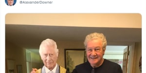 Alexander Downer with a cut-out of King Charles III.