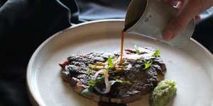 Southern Ranges flank steak with wasabi salsa and red wine jus,one of the sharing dishes at Kura.