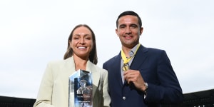 Kyah Simon of the Matildas poses with the Don Award,and Socceroos great Tim Cahill poses with his medal after being inducted into the Sport Australia Hall of Fame at a ceremony at the MCG on Friday.