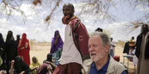 World Food Program chief David Beasley meets villagers in Wagalla,northern Kenya,in August.