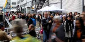 The rain did nothing to deter people from queueing at the Sydney Writers'Festival in Walsh Bay on Thursday.