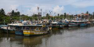 Trawlers anchored in Negombo. The fishermen,intercepted west of Christmas Island on election day,travelled on a similar boat.
