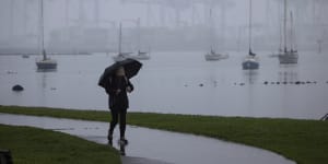 Braving the rain in Williamstown on Monday morning.