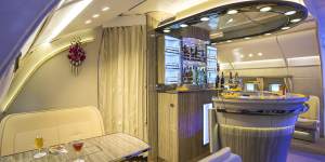 If you manage to snag the table for four at the Emirates bar on board its Airbus A380,don’t hog it. 