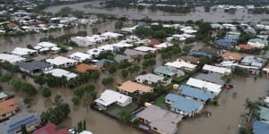 Queensland flood victim's biggest concern is getting eaten by a croc