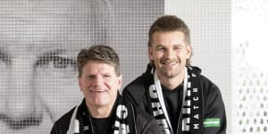 Never forgotten:St Kilda legend Robert Harvey and current player Dan Butler pose in front of a mural of Danny Frawley ahead of “Spud’s Game”.