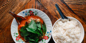 Red curry of barbecue duck with snake bean and sweet basil.