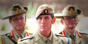 Ben Roberts-Smith,middle,after receiving his Victoria Cross in 2011.