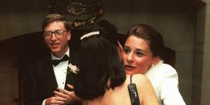 In 1994,as newlyweds,Bill Gates and Melinda French greet guests in a reception line at a private estate in Seattle. 