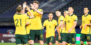 Harry Souttar,second from left,has backed the depth of the Socceroos squad preparing to face Vietnam.