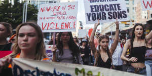 Women rally in Sydney’s CBD on Saturday.