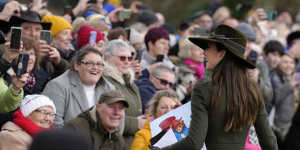 Kate,Princess of Wales smiles at the crowd after attending the Christmas day service in Norfolk in 2022. 