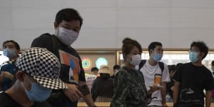A visitor to an Apple store wears a t-shirt promoting Tik Tok in Beijing.