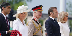 British Prime Minister Rishi Sunak,Queen Camilla,King Charles,French President Emmanuel Macron and wife Brigitte Macron at the Normandy Memorial on Thursday. Sunak did not stay long.