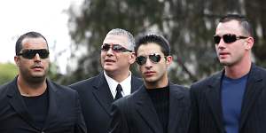 Mick Gatto (second from left) arrives at Saint Ignatius Church in Richmond for the funeral of Mario Condello in 2006.