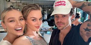 Justin Hemmes’ partner,Madeline Holtznagel (centre),with pop star Harry Styles.