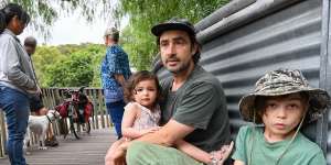 Gardener Paul Garvey with his children Scout Garvey,8,and River Garvey,2.