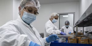 Israeli workers pack medical cannabis,at UNIVO Pharmaceuticals in the coastal city of Ashkelon,Israel,Jan. 16,2022