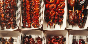 An assortment of skewers,including pork small intestine,chicken isaw,filipino hotdog and chicken wings from Smoky Cravings.