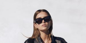 Aje “Constantina” shirt,$395,and pants,$355. Bottega Veneta sunglasses,$790,from Eyewear Index. Tony Bianco “Quincy” boots,$290.
