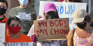 Abortion rights supporters gather to protest the Texas law. 