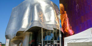 The MoPop building was designed by Frank Gehry and features his signatures curves and reflective surfaces.