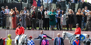 Bravado,fashion and protesters on show at the Caulfield Cup