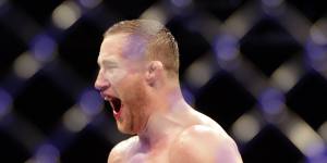 Blood,sweat,no cheers:Gaethje upsets Ferguson in fan-free UFC return